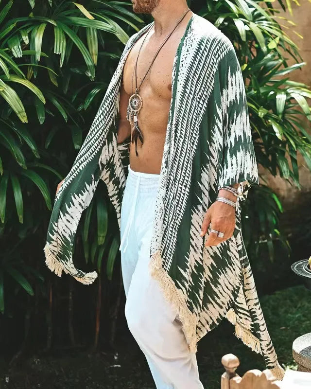 Tulum Green Fringe Kimono in 100% rayon with green and cream stripes, relaxed sleeves, and fringe trim.