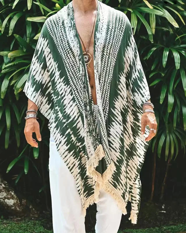 Tulum Green Fringe Kimono, 100% rayon, with green and cream stripes, fringe trim, and relaxed sleeves.