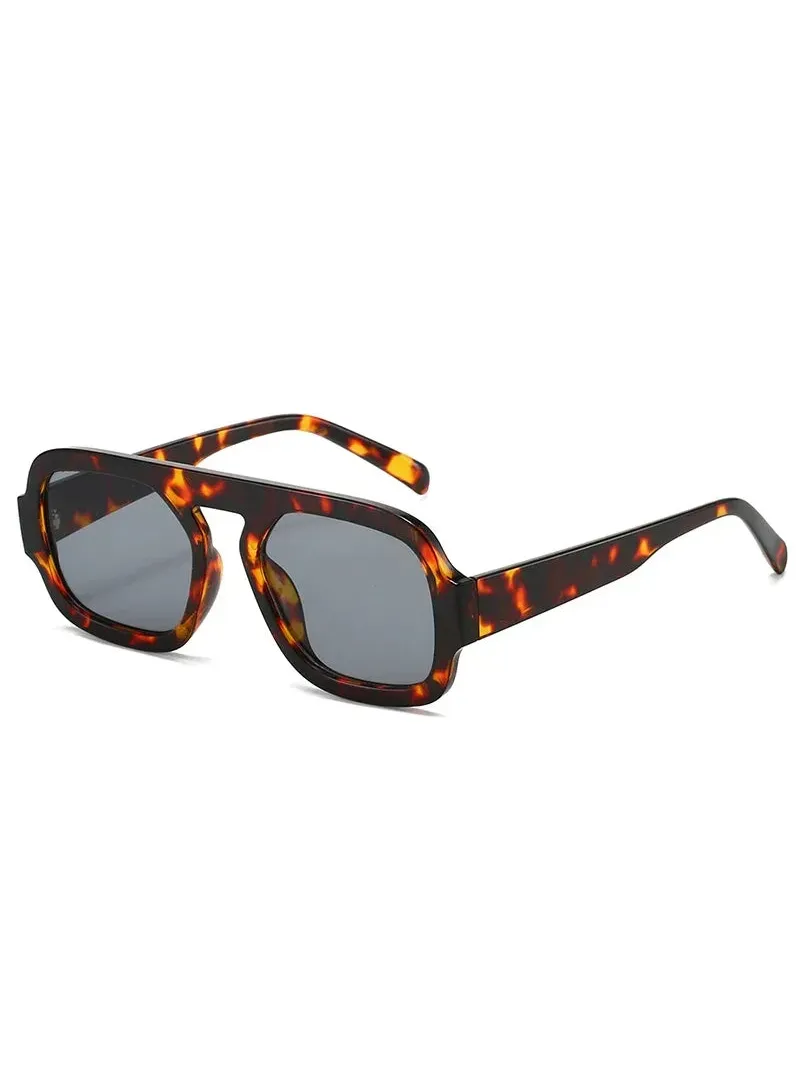 Unisex Brussels retro square sunglasses featuring a tortoiseshell polycarbonate frame and dark UV-400 resin lenses.