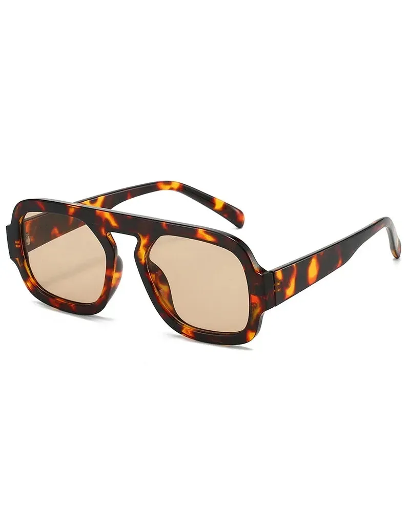 Tortoiseshell square sunglasses with a bold polycarbonate frame and light brown UV-400 resin lenses.