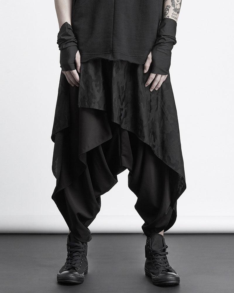 Baggy Ninja Pants in black with layered design, featuring relaxed fit and bold style.