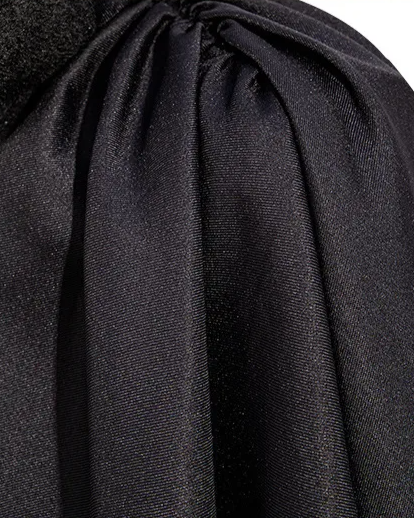 Close-up of the flowing fabric of a Black Gothic SteamPunk Cape, showcasing elegant draping.