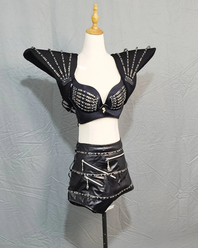 Black LED rave outfit set featuring a structured shoulder piece, bra, and zippered skirt with integrated light strips.