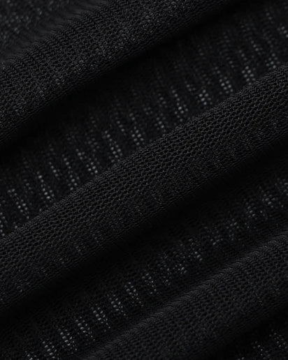 Close-up of black fabric showcasing the mesh texture of the Black Long-Sleeve See-Through Bodysuit.