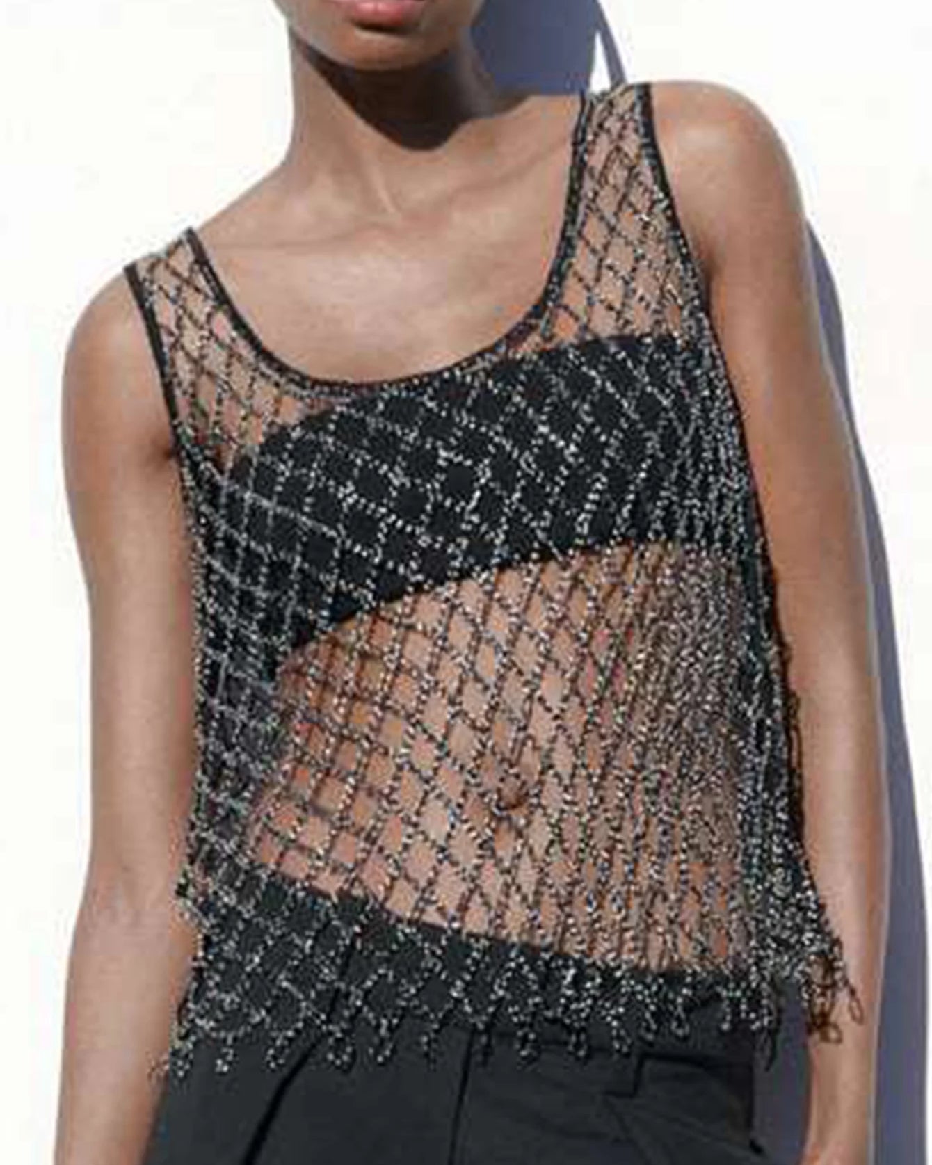 Black See Through Mesh Tank Top with rhinestone detailing for edgy festival outfits.