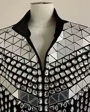 Silver mirror rhinestone men's vest with geometric panels and hand-glued rhinestones on a black polyester base.