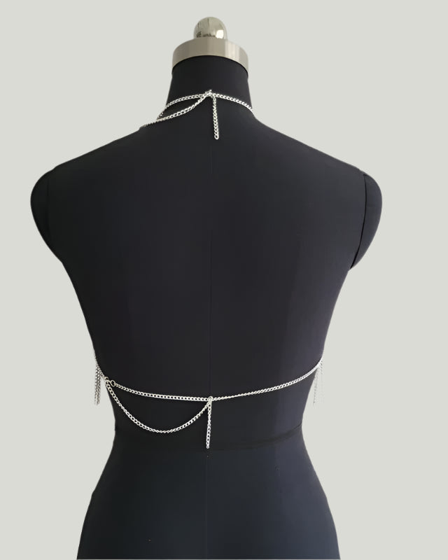 Back view of Body Chain Tank Top featuring shimmering metal links for a bold fashion statement.