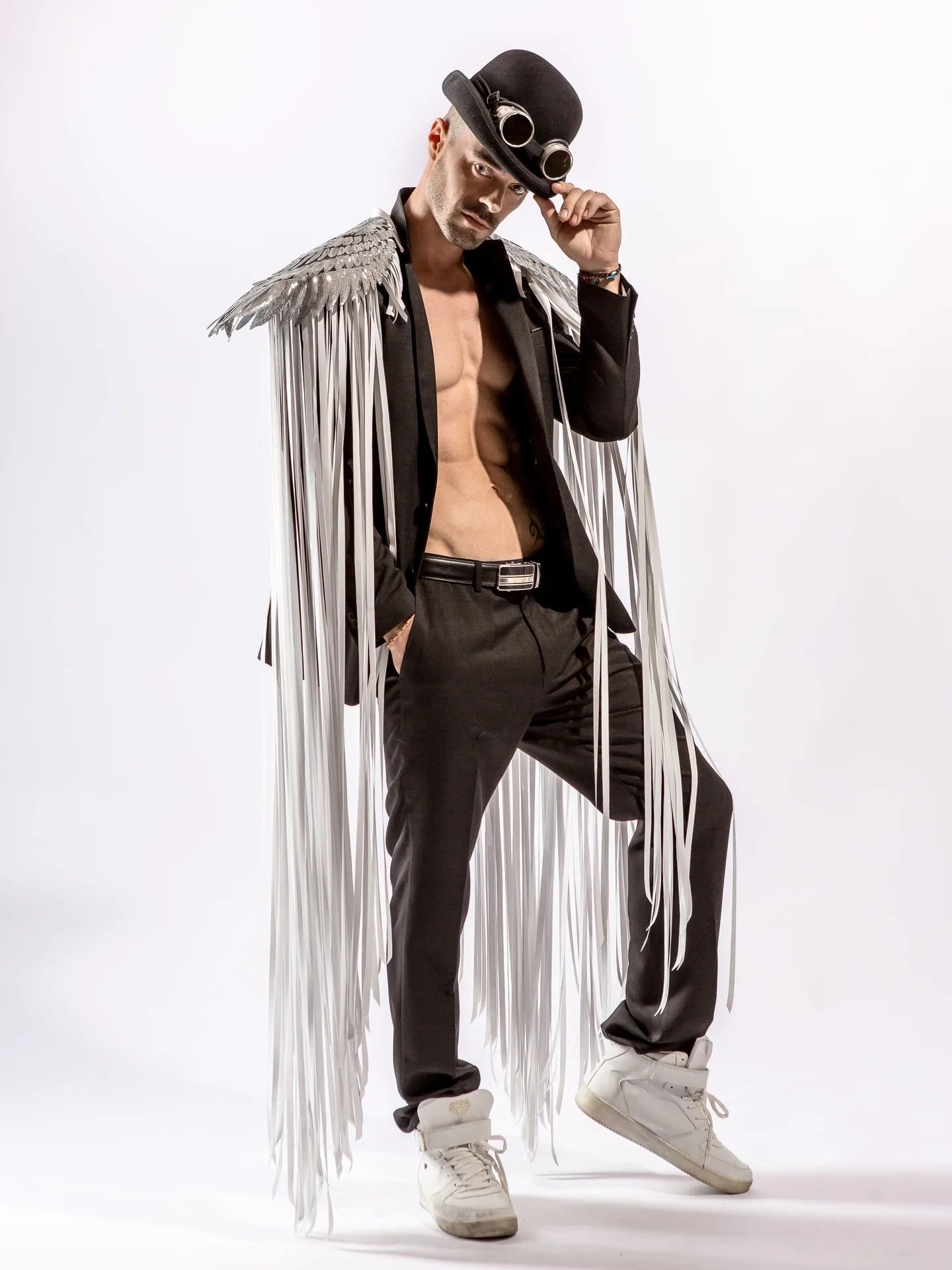 Cosplay Long Tassel Wings worn by a model in a stylish black outfit with silver tassels.