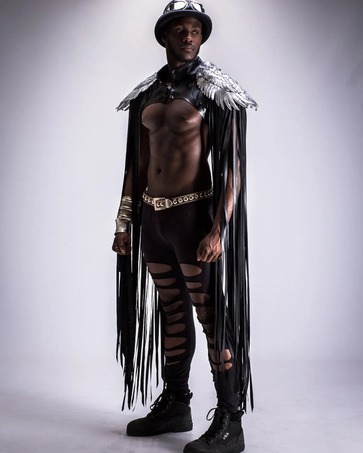Cosplay Long Tassel Wings worn by a model showcasing tassels and metallic accents in a striking pose.
