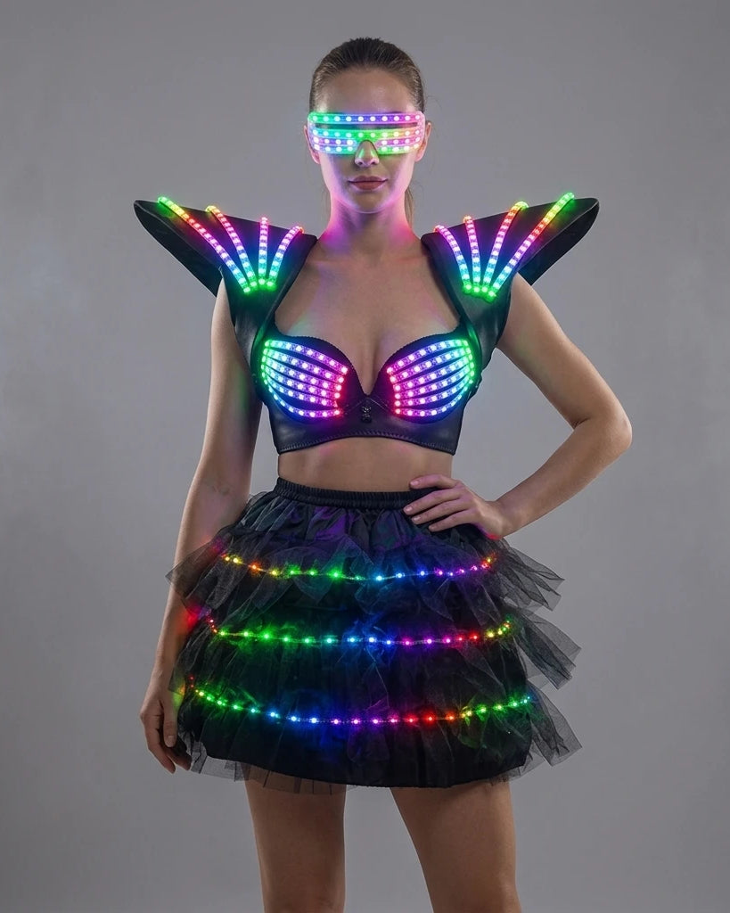 Futuristic black LED tutu bra set with glowing shoulder pieces and matching light-up glasses for festival performances.