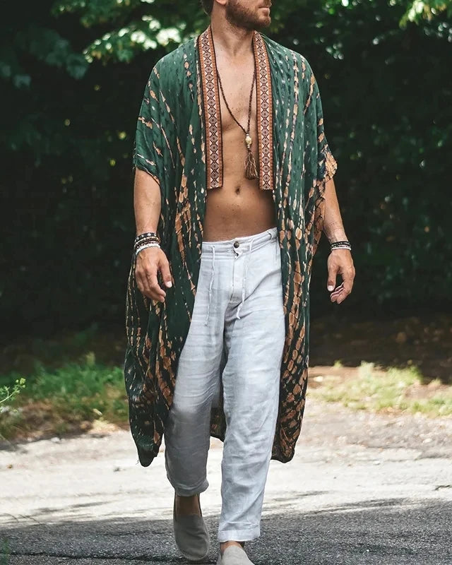 Kimono tribal vert Bali unisexe en rayonne avec imprimé géométrique, franges et fentes latérales.