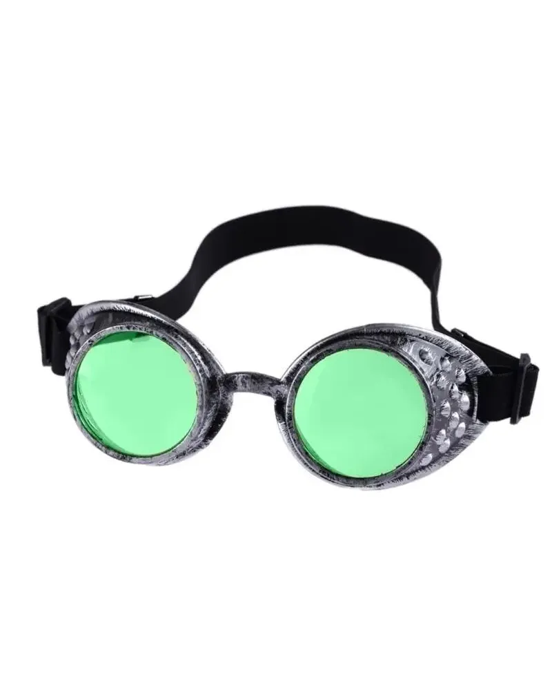 Vintage steampunk goggles with distressed silver metallic frames, bright green lenses, and a black adjustable elastic strap.