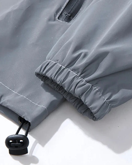 Close-up of the cuff detailing on the Grey Reflective Festival Jacket, showcasing premium quality material.