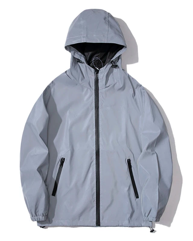 Grey Reflective Festival Jacket in lightweight polyester with hood and zipper pockets.