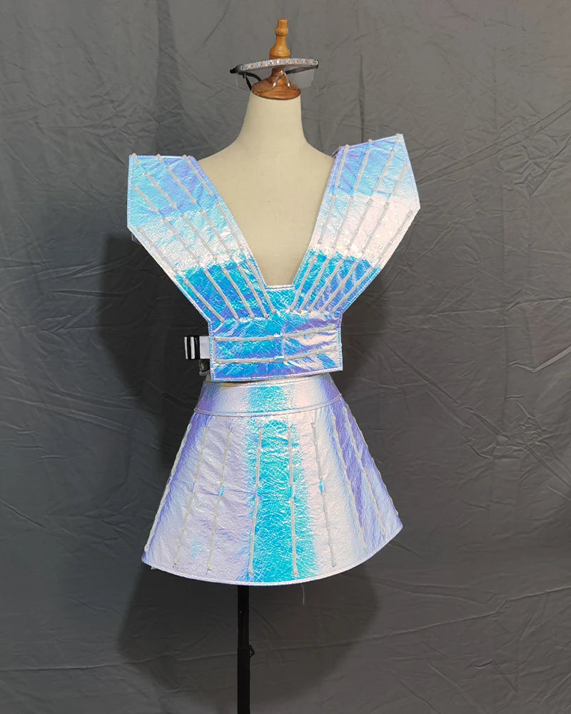 Futuristic iridescent LED dress with a structured bodice and pleated skirt on a mannequin.