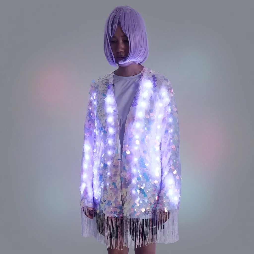 Iridescent sequin fringe jacket featuring integrated LED lights and a remote-controlled glowing design for festival wear.