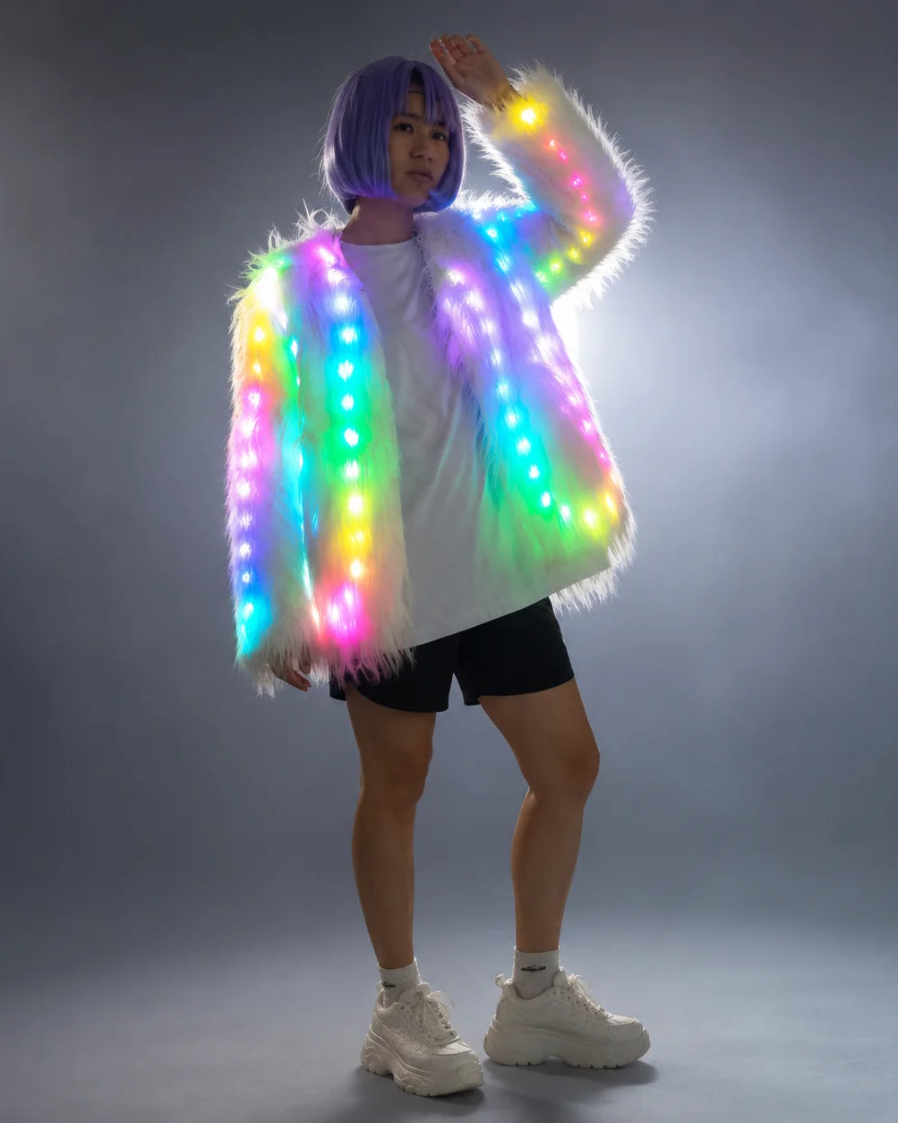 Plush white faux fur jacket featuring integrated, multi-colored LED lights with a remote-controlled glowing effect.