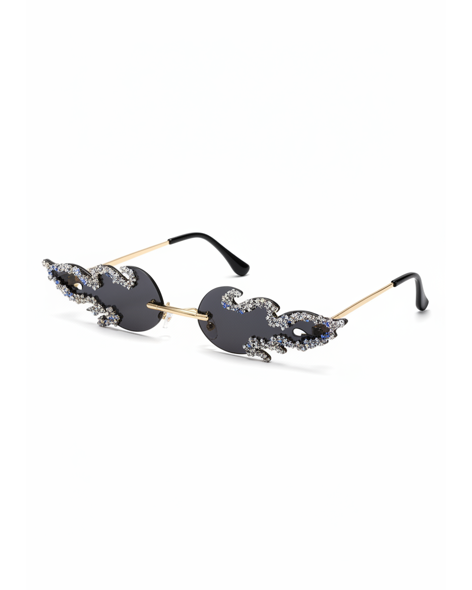 Luna Flame Crystal Rimless Sunglasses with black lenses, gold arms, and blue/clear flame-shaped crystal embellishments.