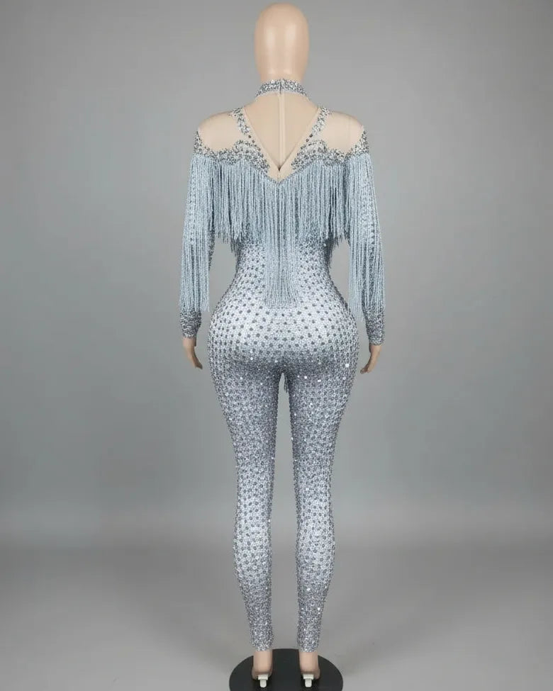 Luna Rhinestone Fringe Jumpsuit: Full-length, nude spandex base with all-over rhinestones and a dramatic white fringe cape.