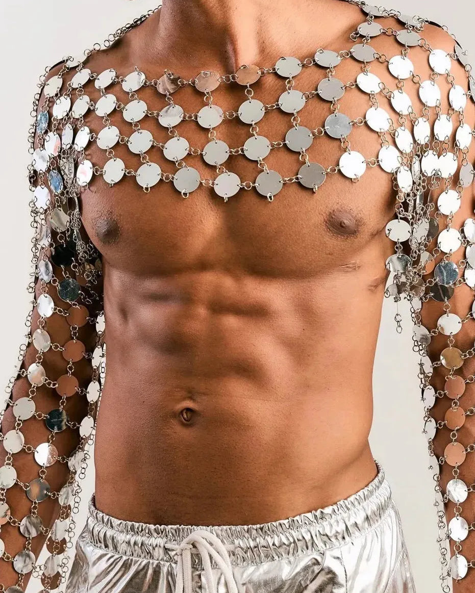 close-up of metal chain disc crop top with shiny circular discs reflecting light