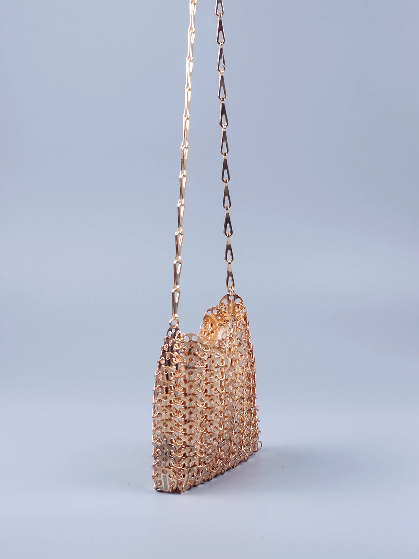 Metallic Sequin Bag with shiny metallic finish and stylish chain strap for festivals and parties.