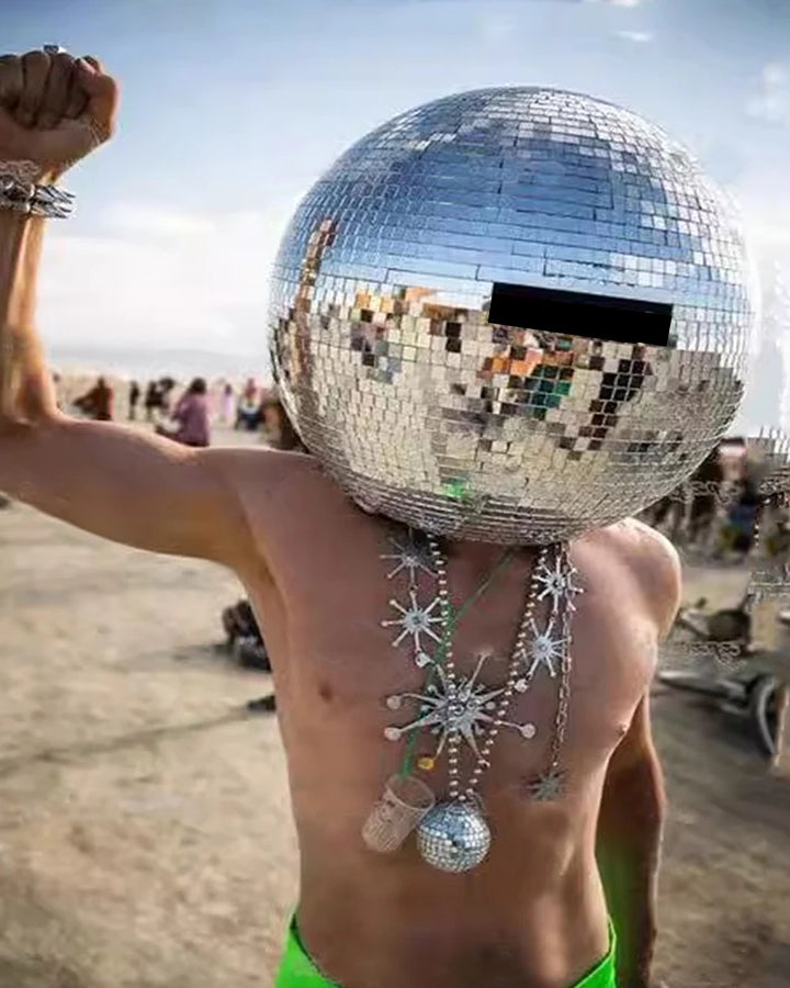 40cm Mirror Disco Ball Helmet made of ABS with hundreds of mirror panels, worn by a person outdoors.