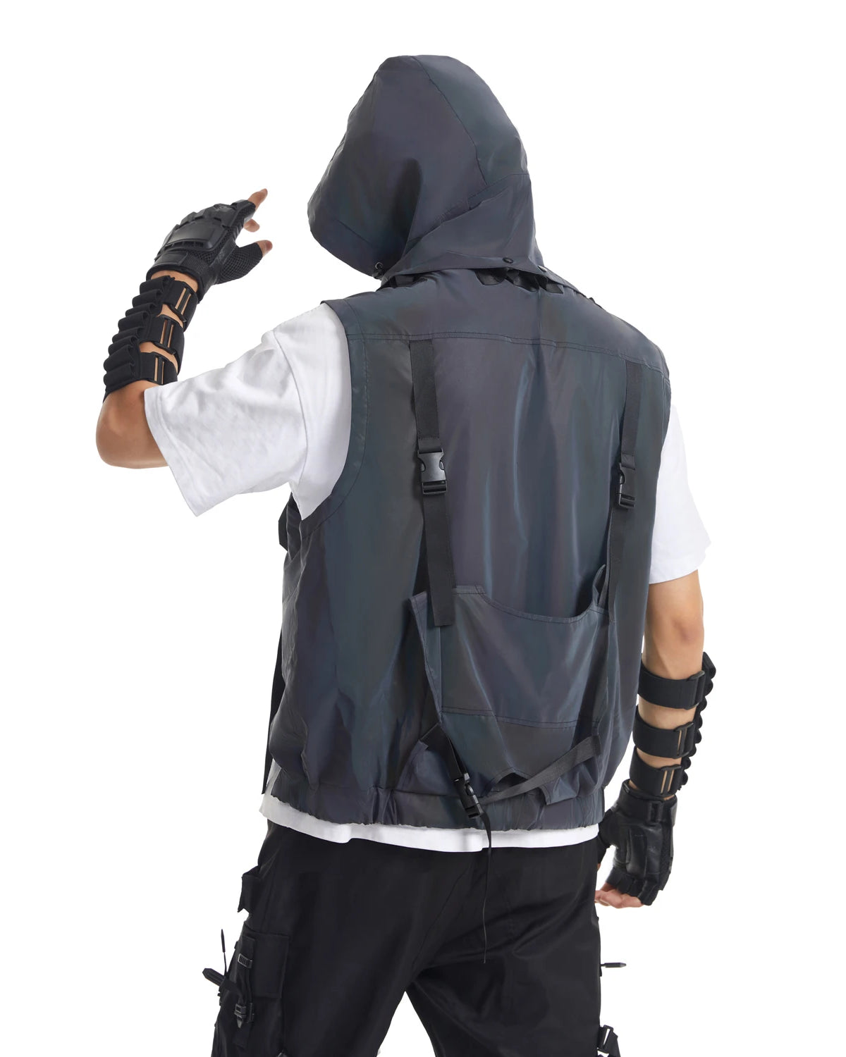 Multicolor reflective techno vest with hood, worn over a white tee, featuring adjustable straps and pockets.