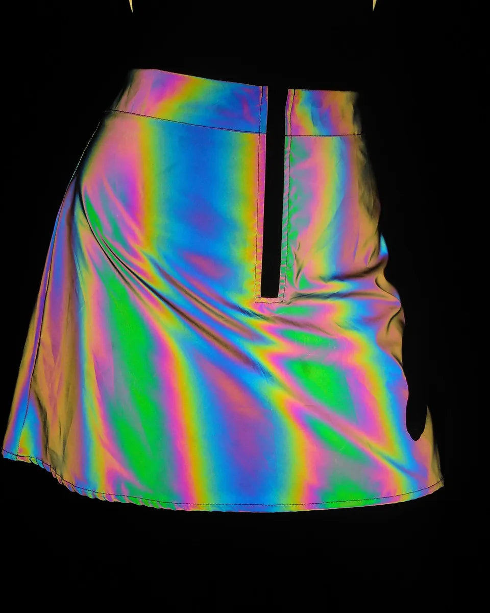 Multicolor reflective mini skirt with a front zipper, showcasing its iridescent rainbow effect.