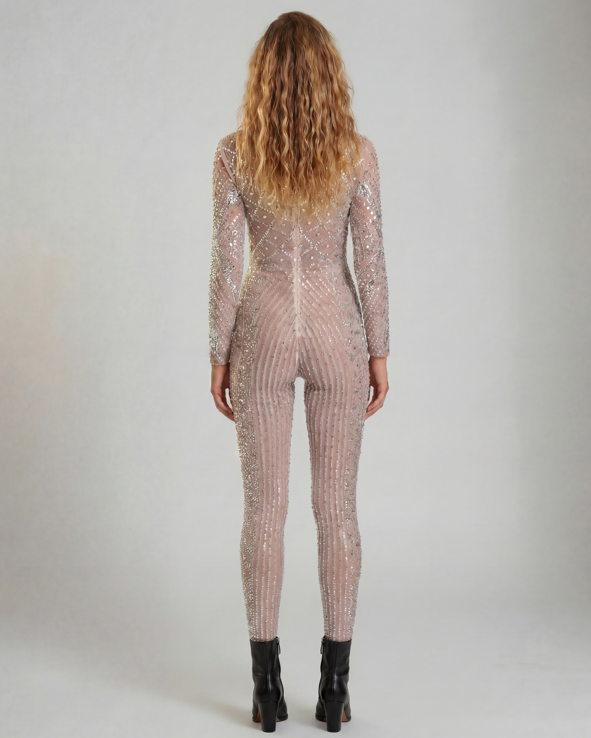 Nova Silver Rhinestone Jumpsuit, a fitted, long-sleeve, full-coverage garment with hand-glued rhinestones.