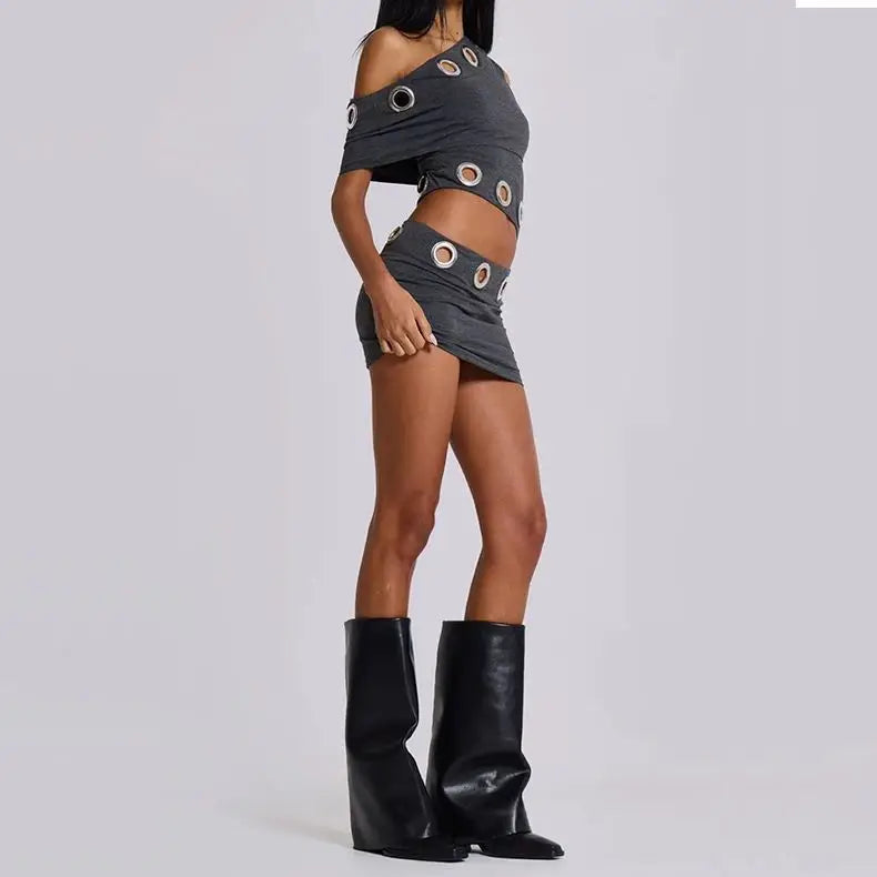 Two Piece Off Shoulder Crop Top and Mini Skirt Set featuring cut-out details and a flattering fit.