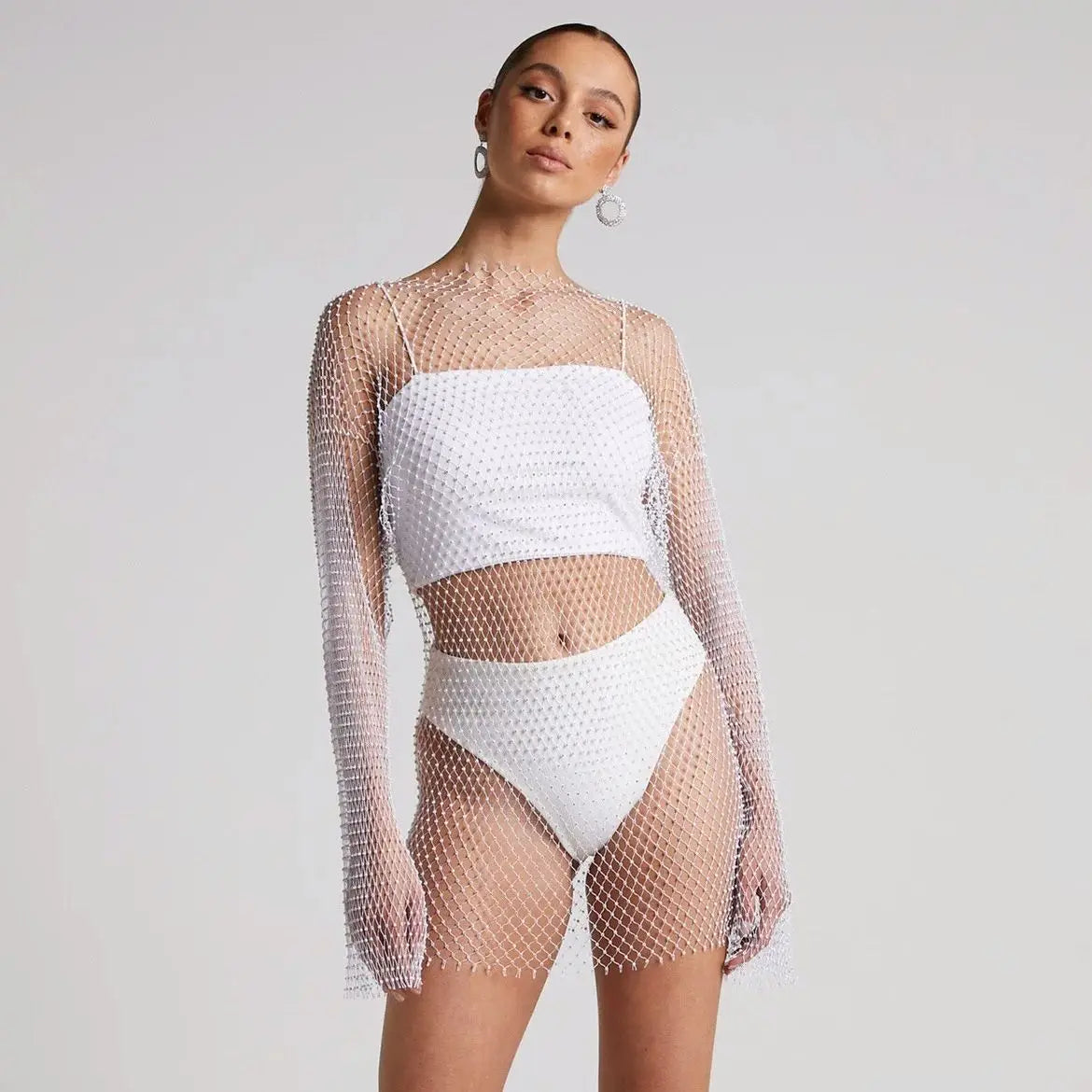 Model with White Fishnet Dress with Rhinestone Diamonds