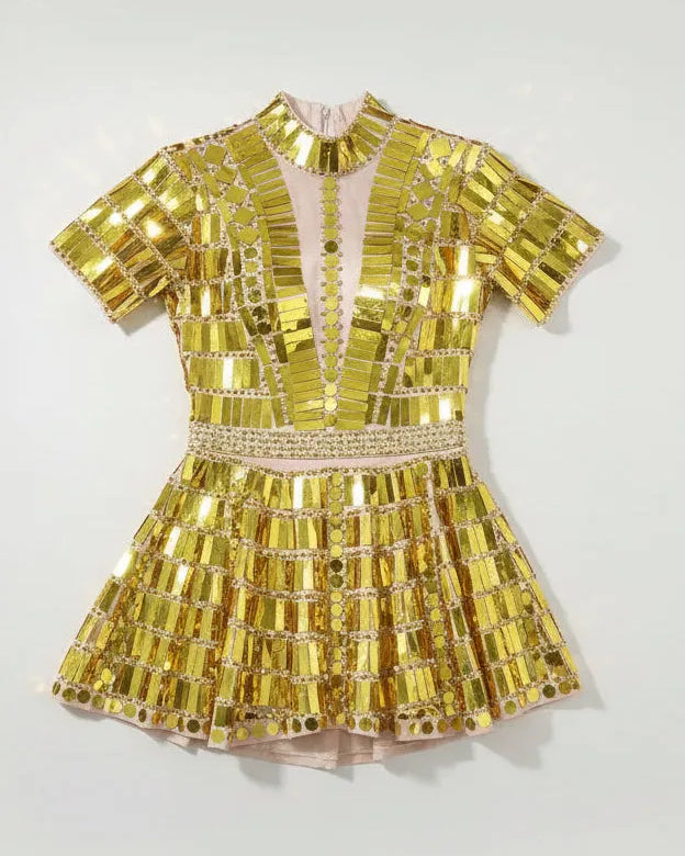 Gold reflective mirror sequin dress with short sleeves, high neck, and a body-contouring fit.