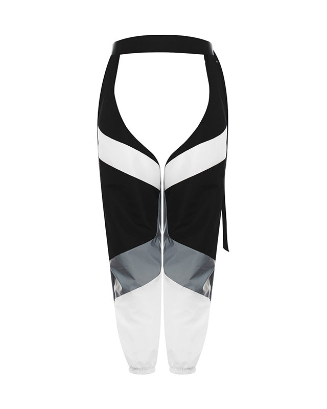 Rave Rebel Pants featuring a unique cut and trendy black, white, and grey design, perfect for festivals.