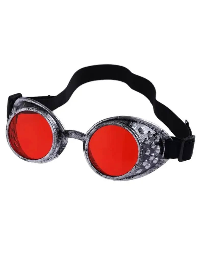 Vintage steampunk goggles with distressed silver frames, bright red lenses, and a black elastic strap.