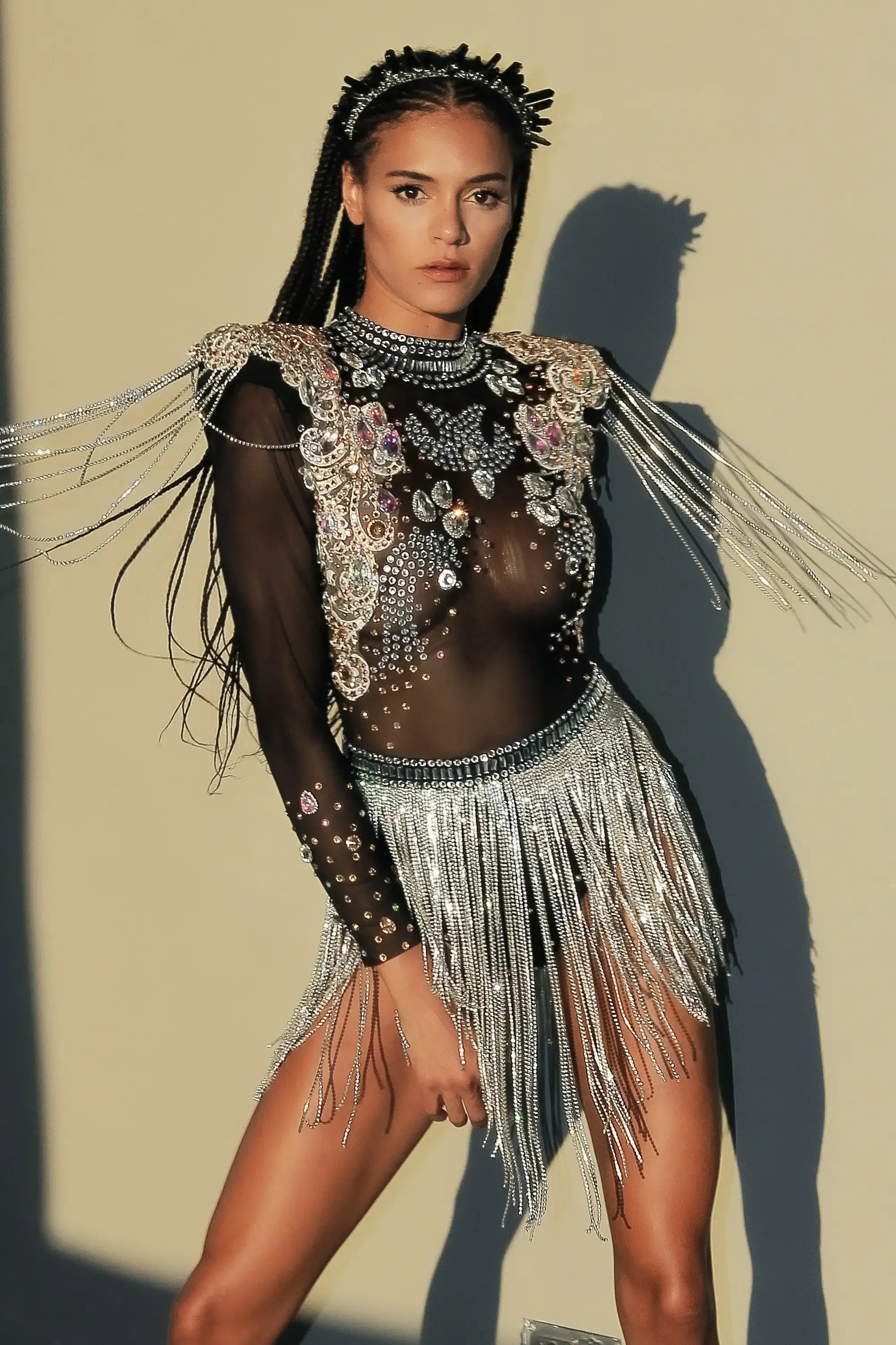 Rhinestone Tassel Festival Bodysuit with glittering rhinestones and flowing tassels, perfect for festivals.