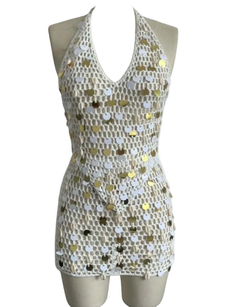 halter sleeveless top and skirt set close-up of white fabric with gold sequins
