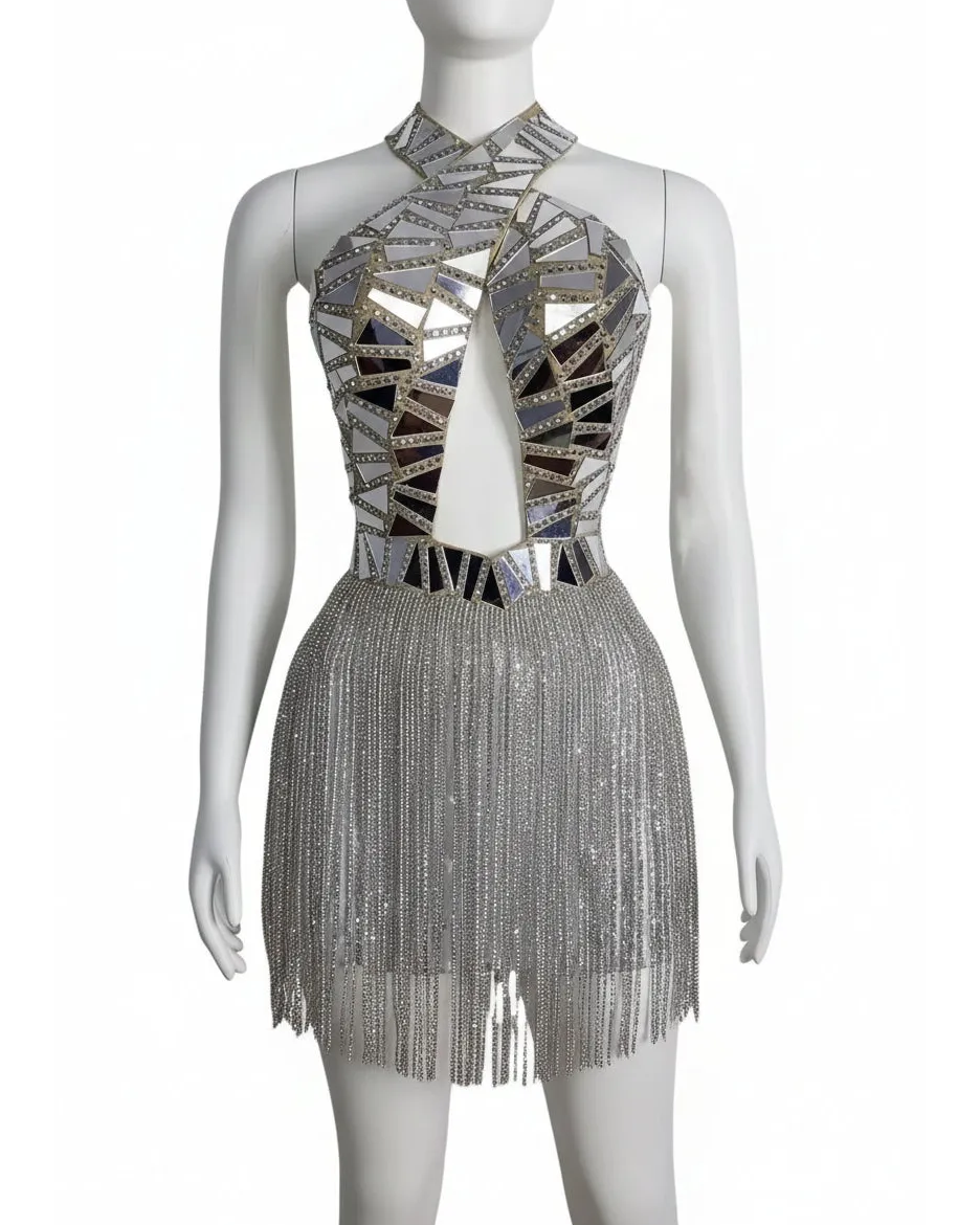 Silver mirror sequin fringe dress with a halter neckline and front cutout on a mannequin.