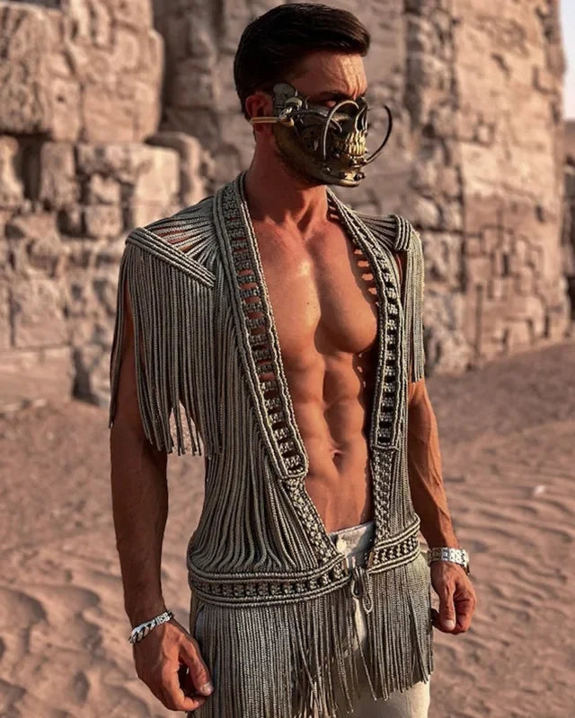 Silver crochet fringe men's cardigan with intricate knotwork and dramatic flowing fringe, worn open-front.