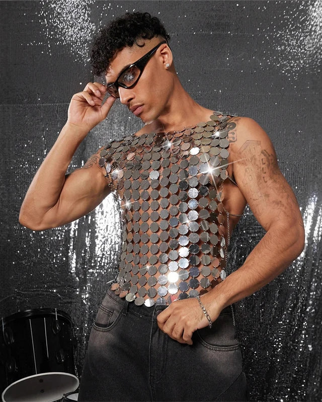 Men's silver mirror disc chain vest, one size, with open chain sides, worn by a man.