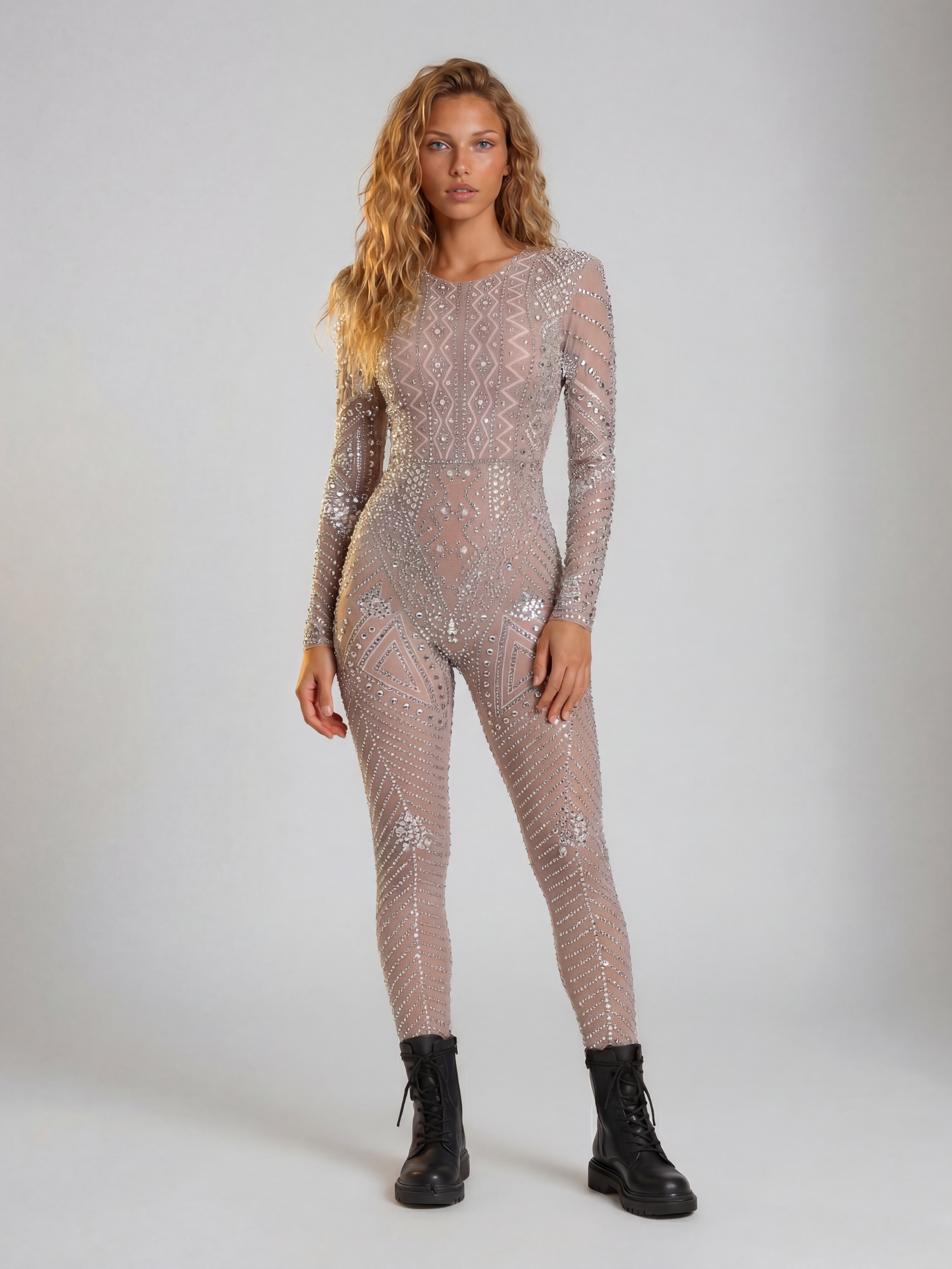 Nova Silver Rhinestone Jumpsuit: full-body, long-sleeve, fitted, sheer nude polyester-elastane with geometric rhinestone patterns.