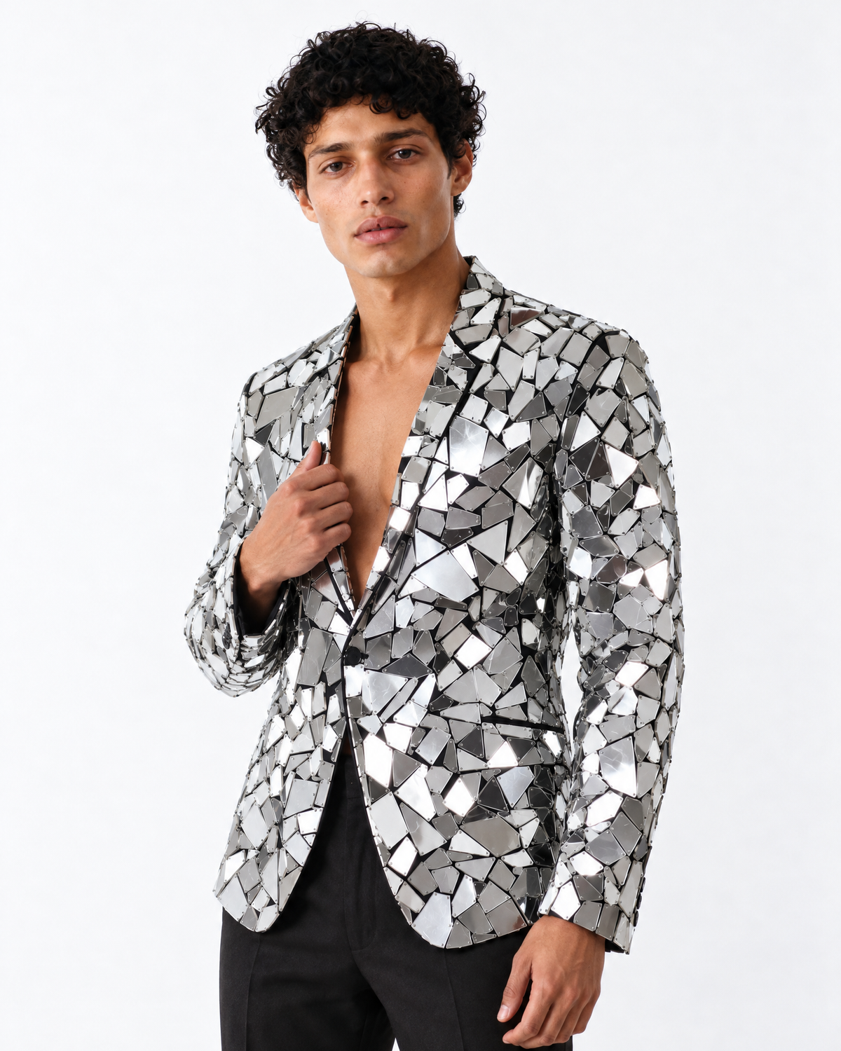 Tailored silver blazer featuring geometric mirror panels on a structured cotton-polyester base for a high-fashion look.
