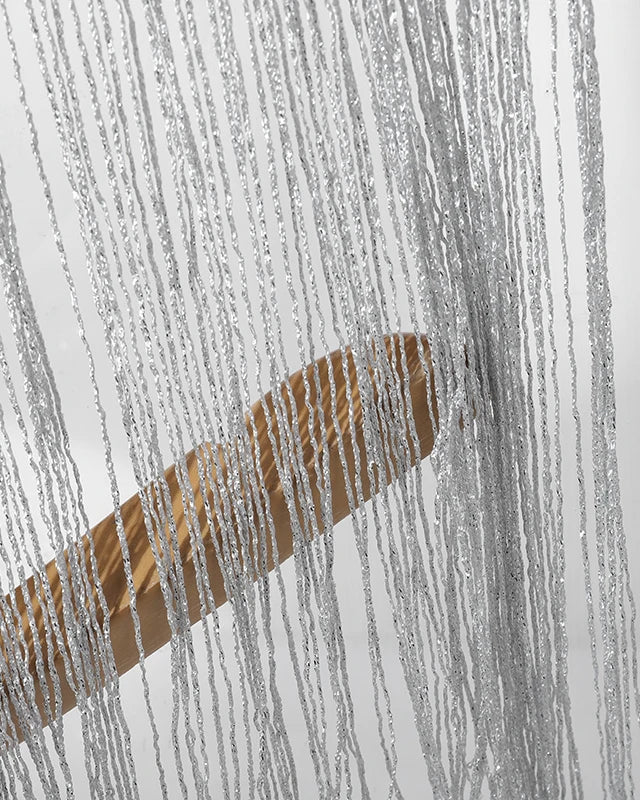 haut court à franges avec pampilles argentées scintillantes et mouvement ludique