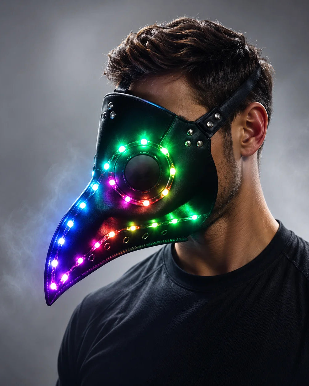 Black faux-leather steampunk plague doctor mask with vibrant, multi-colored LED lights and an adjustable strap.