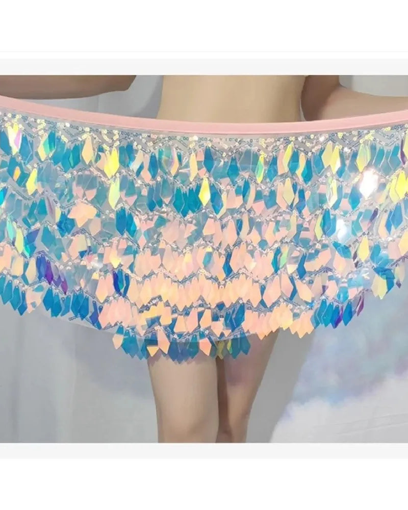 Iridescent sequin mini skirt featuring a light pink elastic waistband and layered diamond-shaped metallic accents.