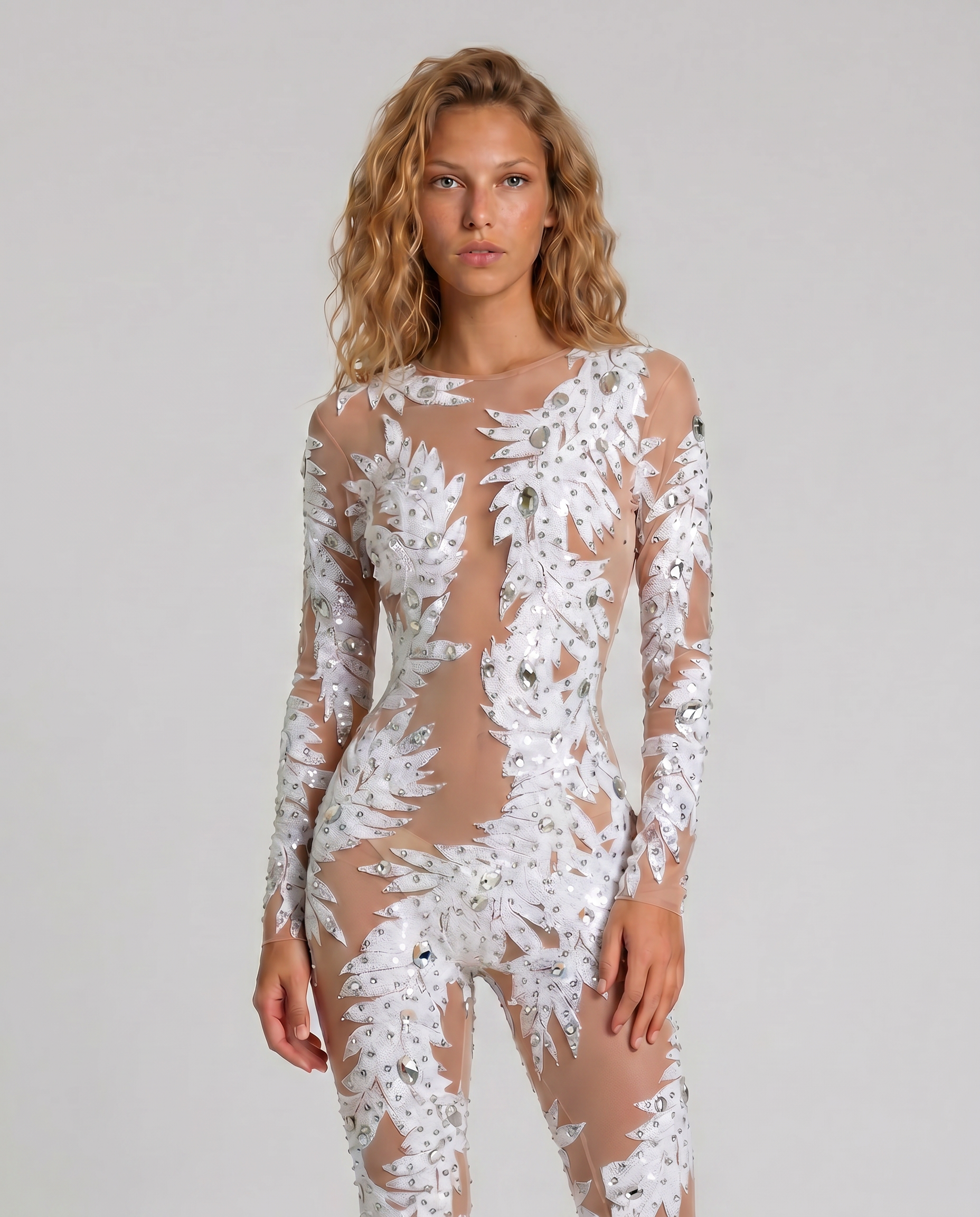 Vivian White Rhinestone Jumpsuit, full-length, sheer spandex with hand-glued rhinestones and sewn sequins.