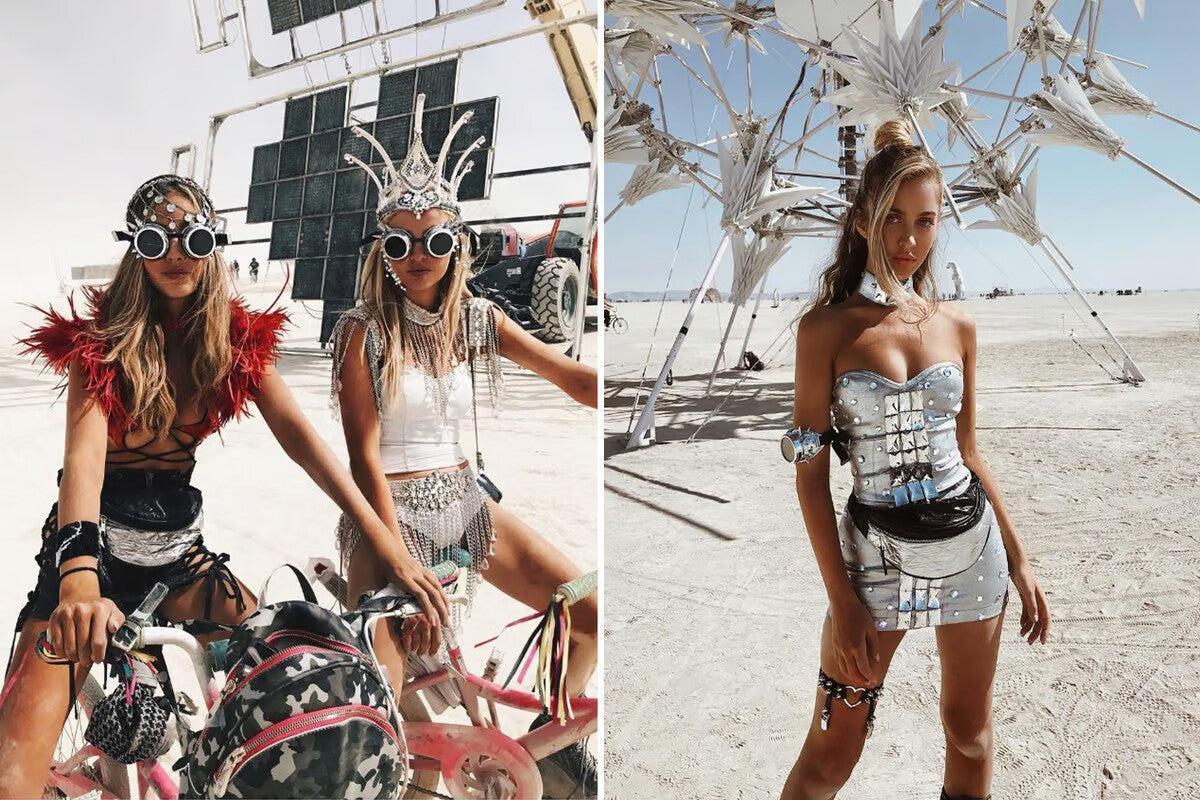 Women in futuristic, metallic Burning Man fashion: silver crowns, goggles, and a strapless mini-dress.