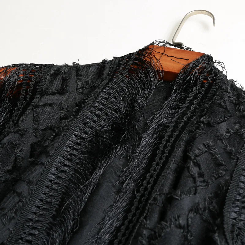 Black Lucian Boho Fringe Vest with textured polyester-cotton blend and dramatic fringe tassels.