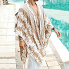 Unisex Tulum Sand Fringe Kimono in 100% rayon, featuring a warm sand and white stripe pattern with natural fringe.