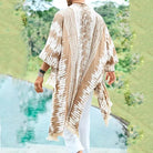 Unisex Tulum Sand Fringe Kimono in soft rayon, featuring a warm sand and white stripe pattern with natural fringe.