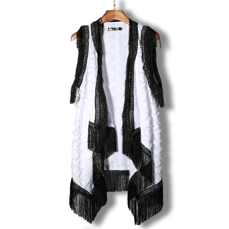 White Lucian Boho Fringe Vest with black fringe tassels on lapels, pockets, and hem.